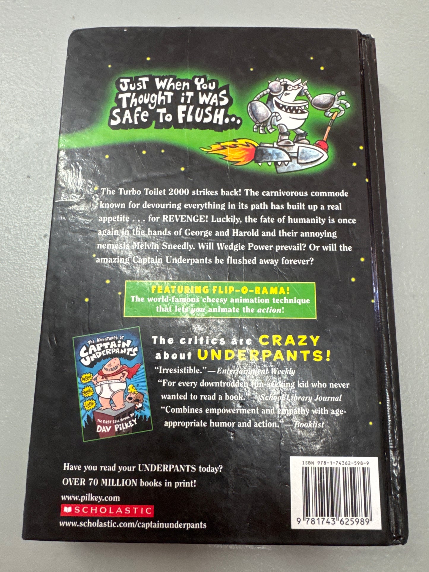 Captain Underpants and the tyrannical retaliation of the turbo toilet 2000. Dav Pilkey. 2014.