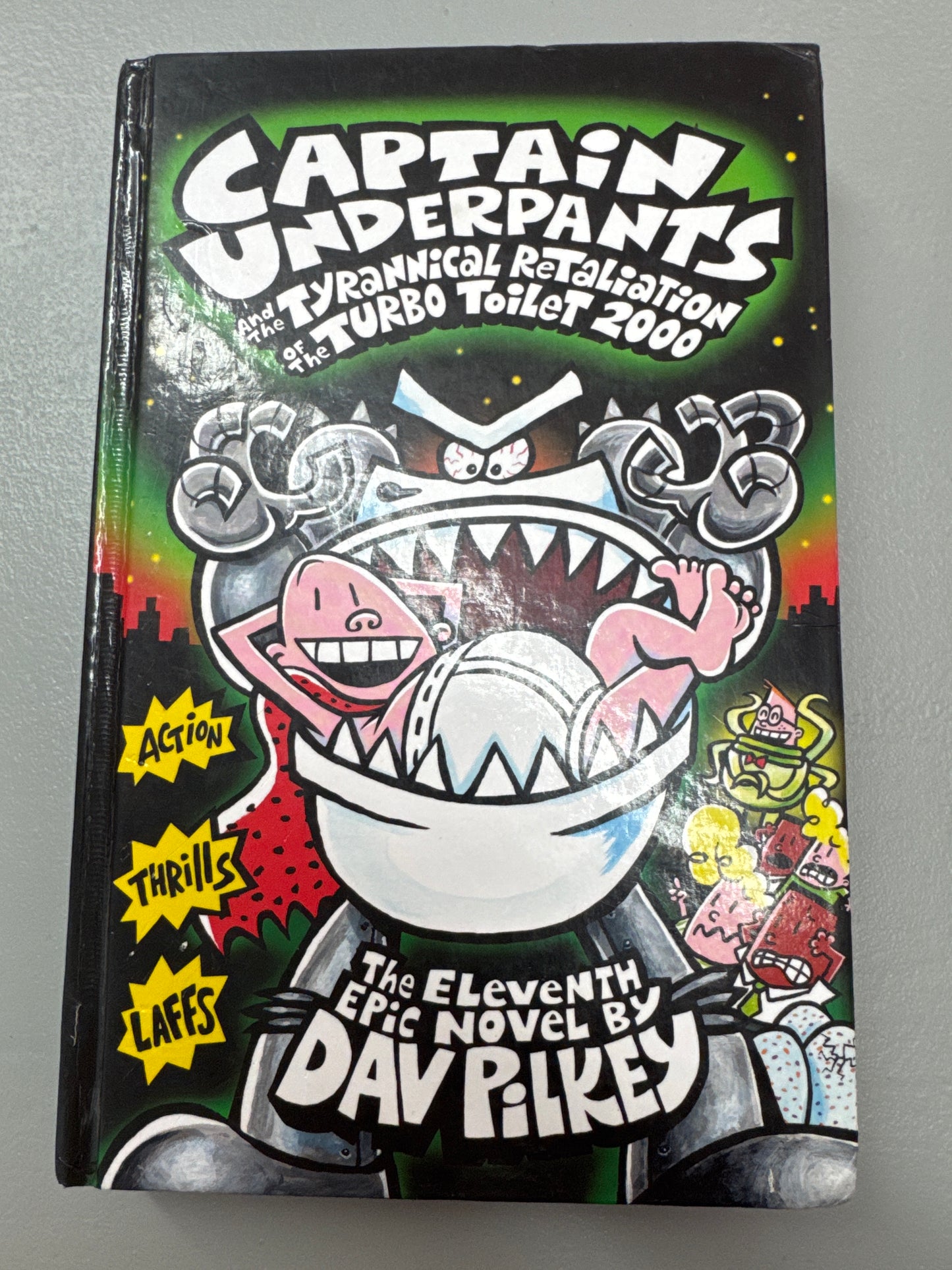 Captain Underpants and the tyrannical retaliation of the turbo toilet 2000. Dav Pilkey. 2014.