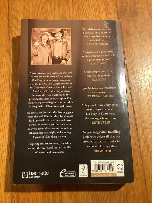 Riding this road: my life making music and travelling this wide land with Slim Dusty. Joy McKean. 2014.