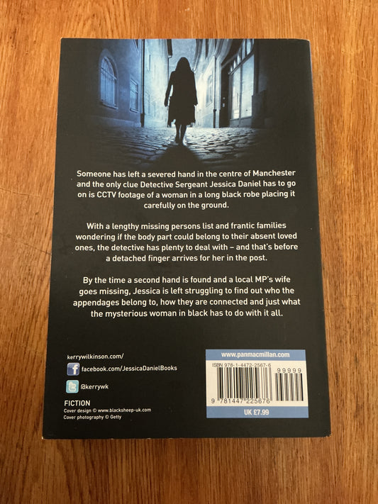 Woman in black. Kerry Wilkinson. 2013.