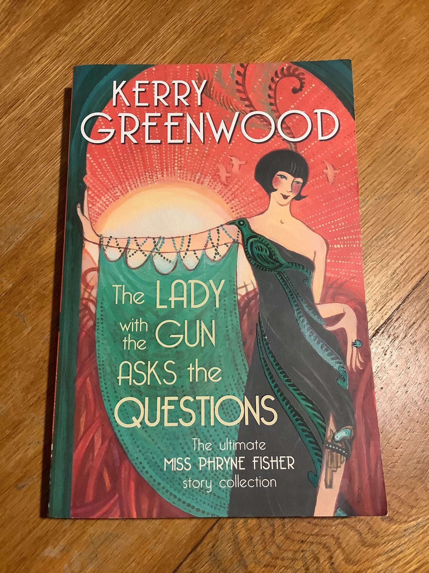 Lady with the gun asks the questions. Kerry Greenwood. 2021.