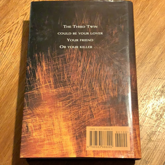 Third twin. Ken Follett. 1996.