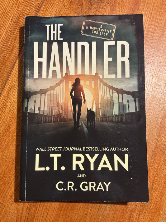The Handler. L. T. Ryan and C. R. Gray. 2023.