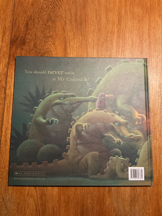 Never smile at a crocodile. Jack Lawrence & Frank Churchill. 2014.