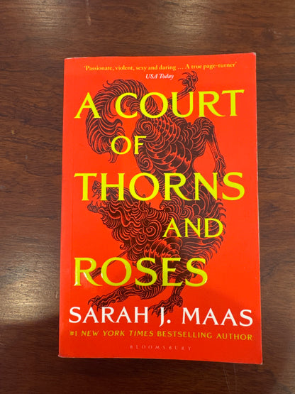 A Court of thorns and roses. Sarah J. Maas.
