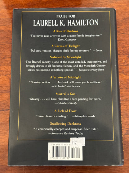 Divine misdemeanors. Laurell K. Hamilton. 2009.