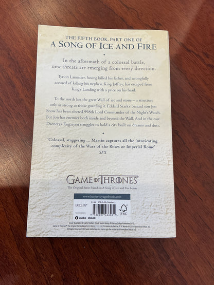 Dance with dragons: Part One: Dreams and dust. George R. R. Martin. 2012.