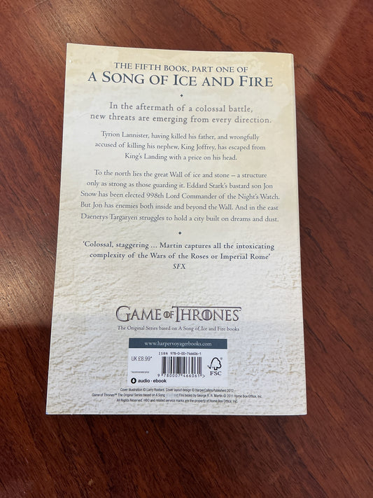 Dance with dragons: Part One: Dreams and dust. George R. R. Martin. 2012.