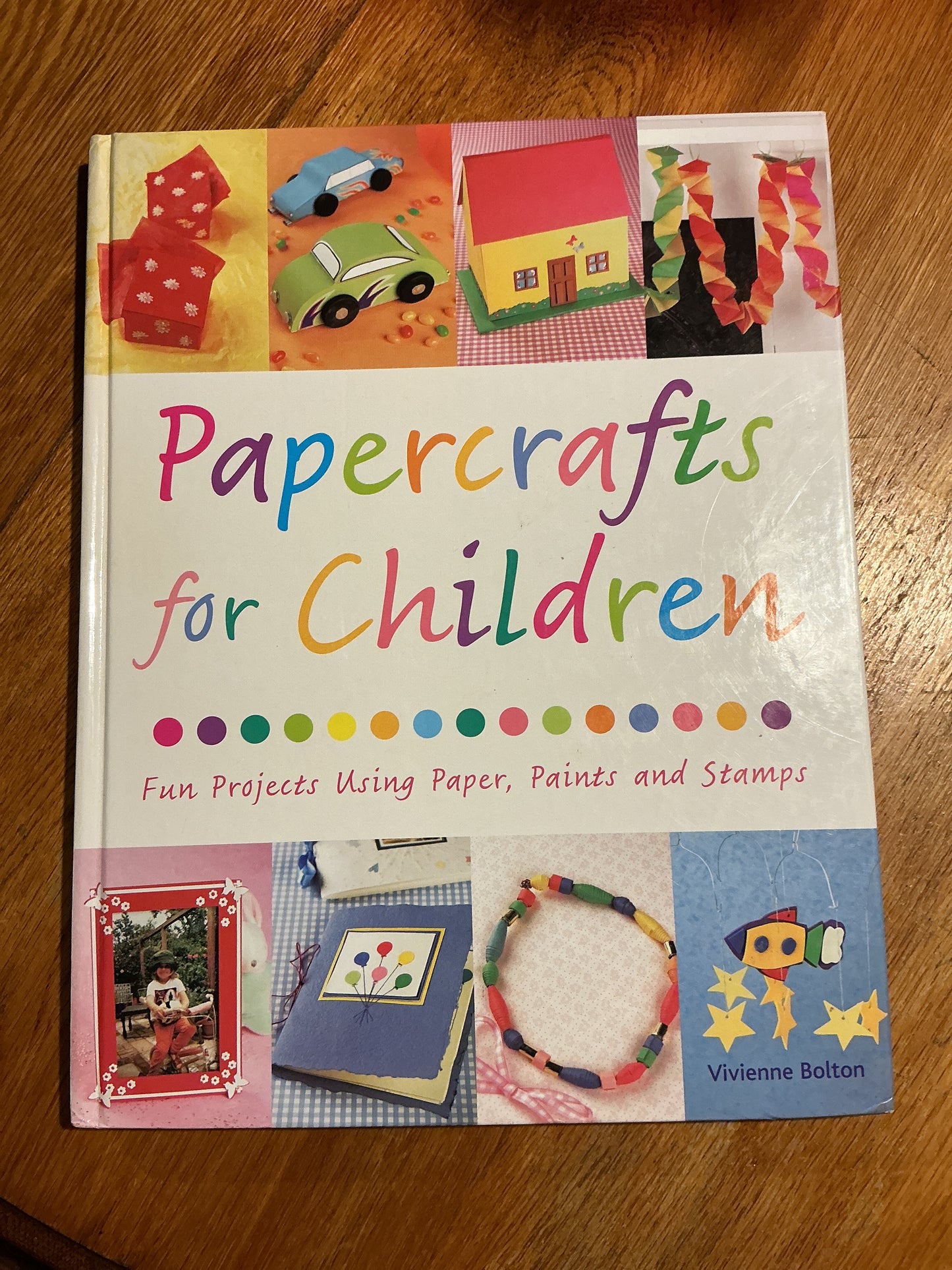 Papercrafts for children: 18 fun projects using paper, paints and stamps. Vivienne Bolton. 2006.