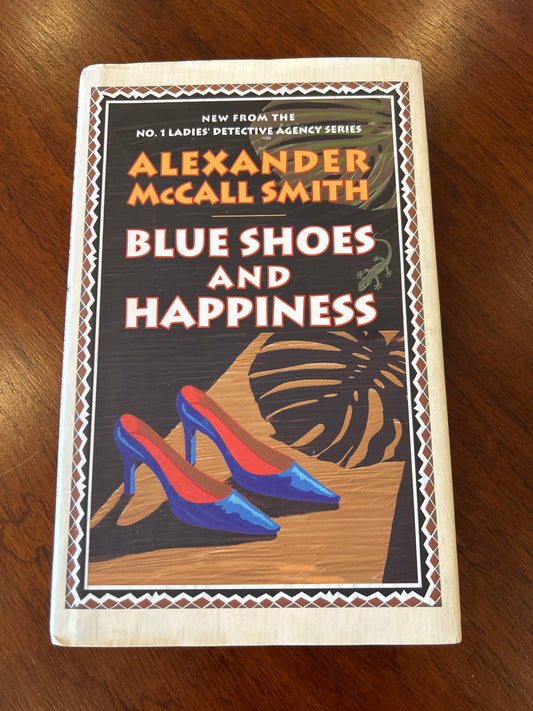 Blue shoes and happiness. Alexander McCall Smith. 2006.