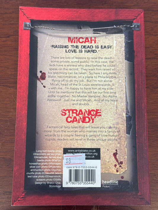 Micah and strange candy. Laurell K. Hamilton. 2006.