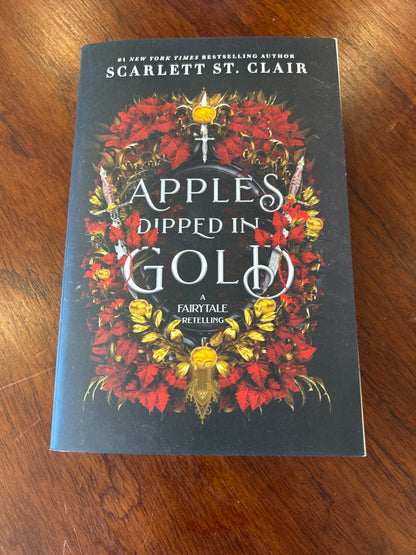 Apples dipped in gold. Scarlett St. Clair. 2024.