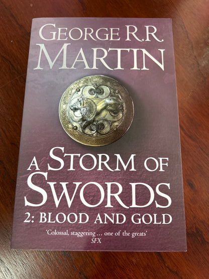 Storm of swords 2: blood and gold. George R. R. Martin. 2003.