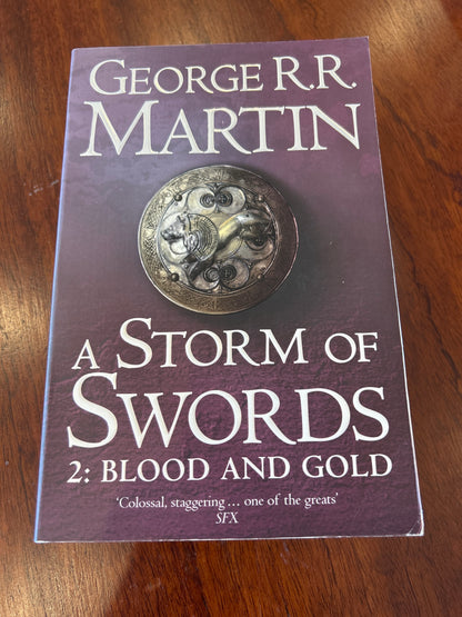 Storm of swords 2: blood and gold. George R. R. Martin. 2011.