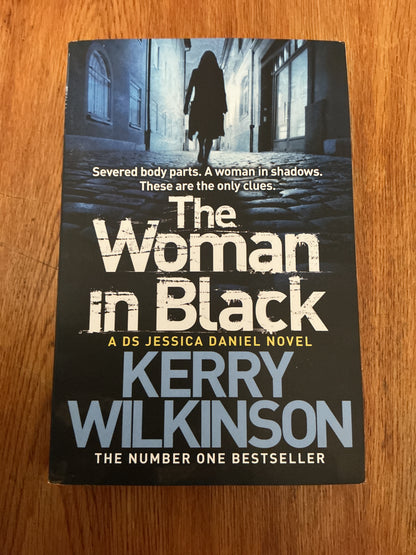 Woman in black. Kerry Wilkinson. 2013.
