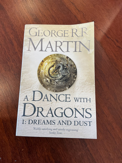 Dance with dragons: Part One: Dreams and dust. George R. R. Martin. 2012.