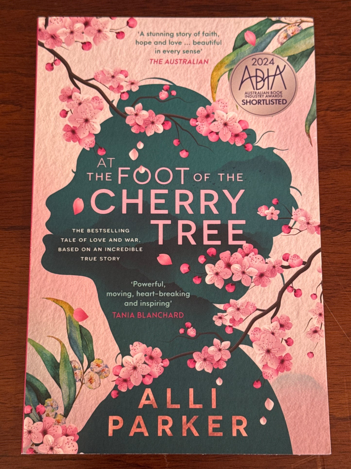 At the Foot of the Cherry Tree. Alli Parker. 2024.