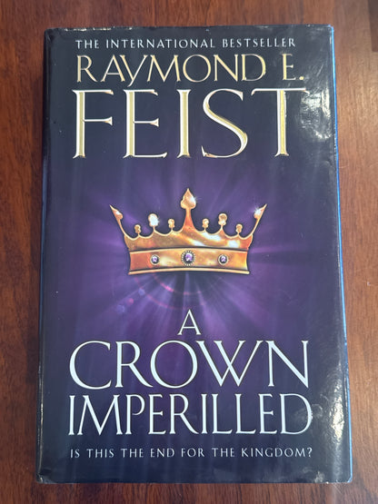 Crown imperilled. Raymond Feist. 2012.