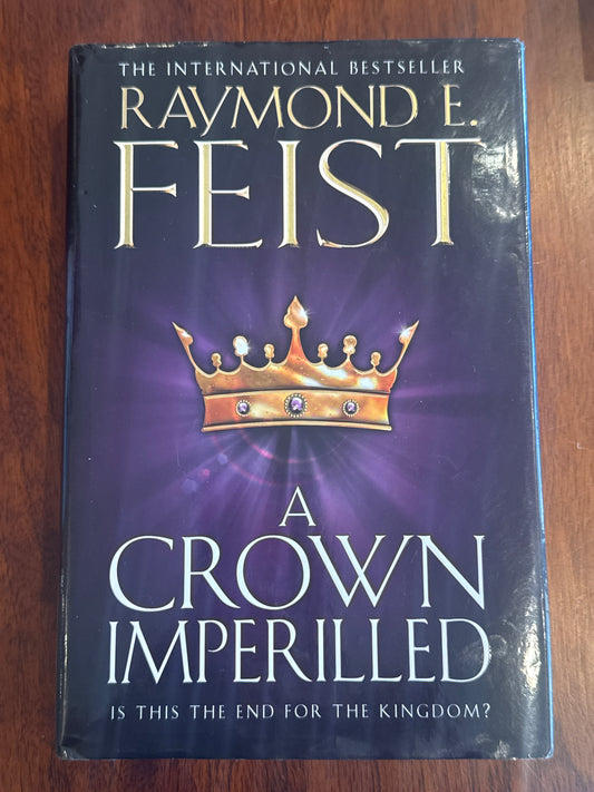 Crown imperilled. Raymond Feist. 2012.