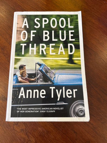 Spool of blue thread. Anne Tyler. 2015.