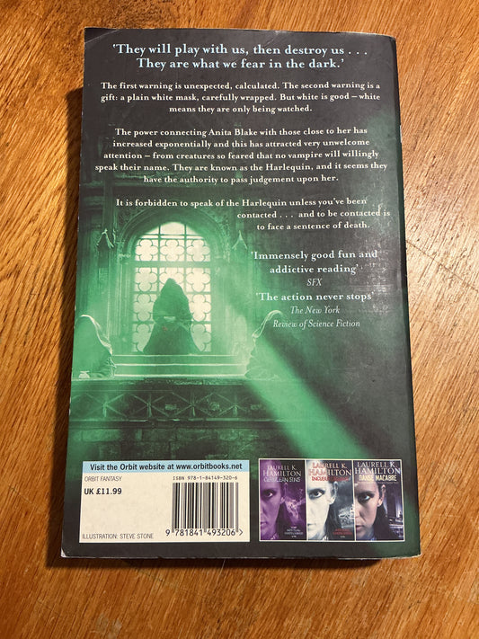 Harlequin. Laurell K. Hamilton. 2007.