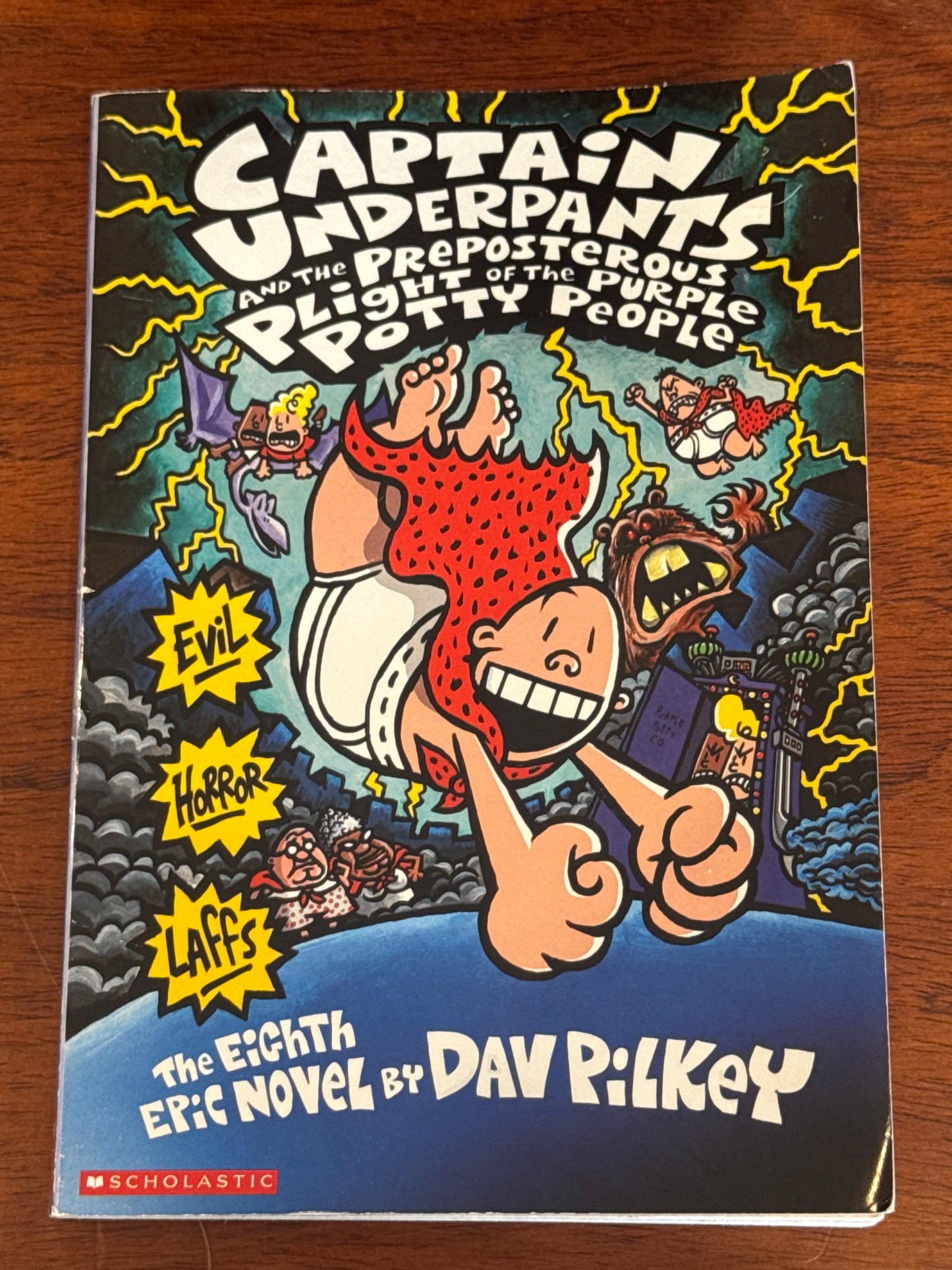 Captain Underpants and the preposterous plight of the purple potty people. Dav Pilkey. 2006.