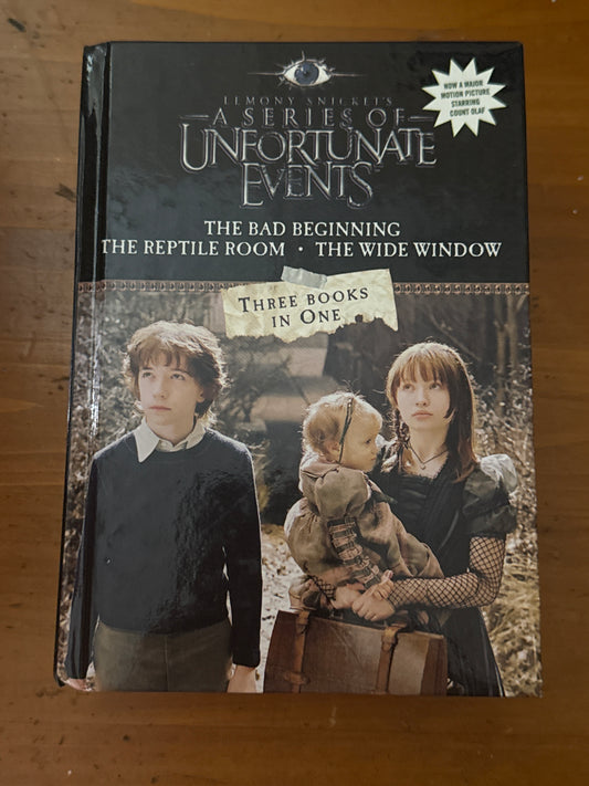 Series of unfortunate events: bad beginning; reptile room; wide window. Lemony Snicket. 2004.