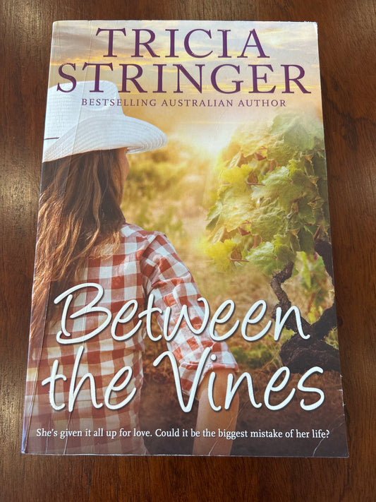Between the vines. Tricia Stringer. 2015.