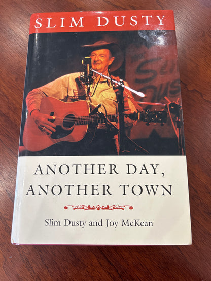 Another day, another town. Slim Dusty and Joy McKean. 1996.