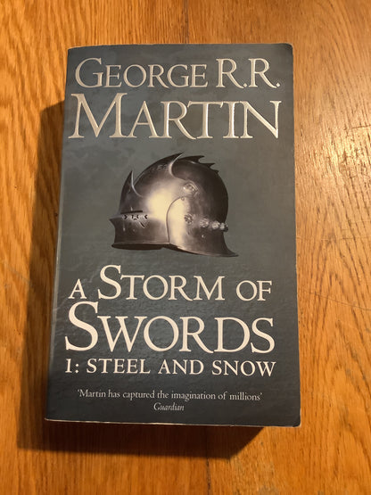 Storm of swords: 1: steel and snow. George R. R. Martin. 2011.