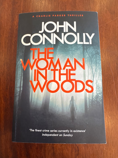 Woman in the woods. John Connolly. 2018.