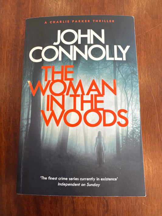 Woman in the woods. John Connolly. 2018.