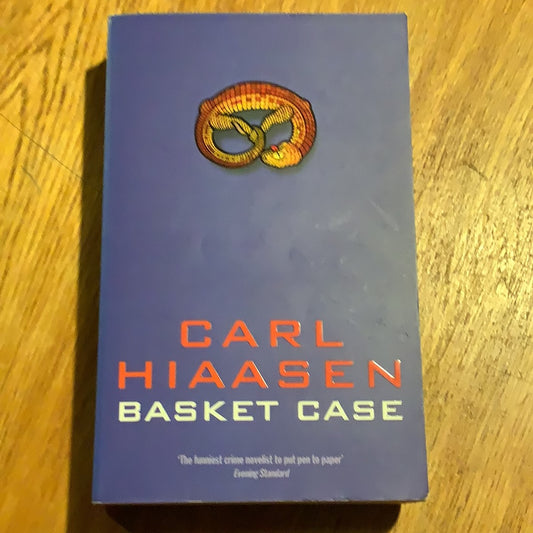 Basket case. Carl Hiaasen. 2002.